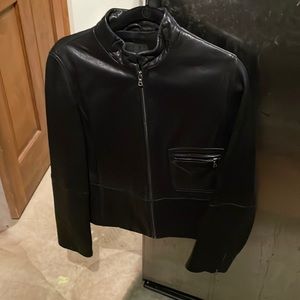 Black leather Tahari jacket zipper front zipper front pocket size med.